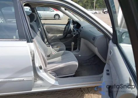 2001 Toyota Corolla Le from USA, damaged, VIN 2T1BR12E41C426052